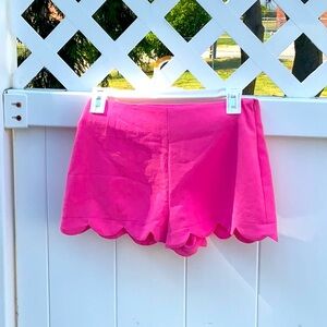 Pink sculpted hem shorts